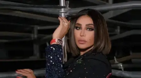 آخر صيحات الفنانة أحلام "باروكة مرصعة بالألماس"
