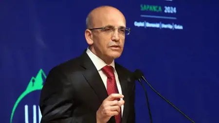 وزير المالية التركي:" سنحسن توزيع الدخل" وزير المالية التركي:" سنحسن توزيع الدخل"