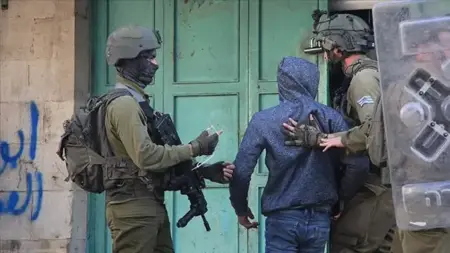 إسرائيل تعتقل 100 فلسطيني من غزة بتهمة انضمامهم لحركة حماس
